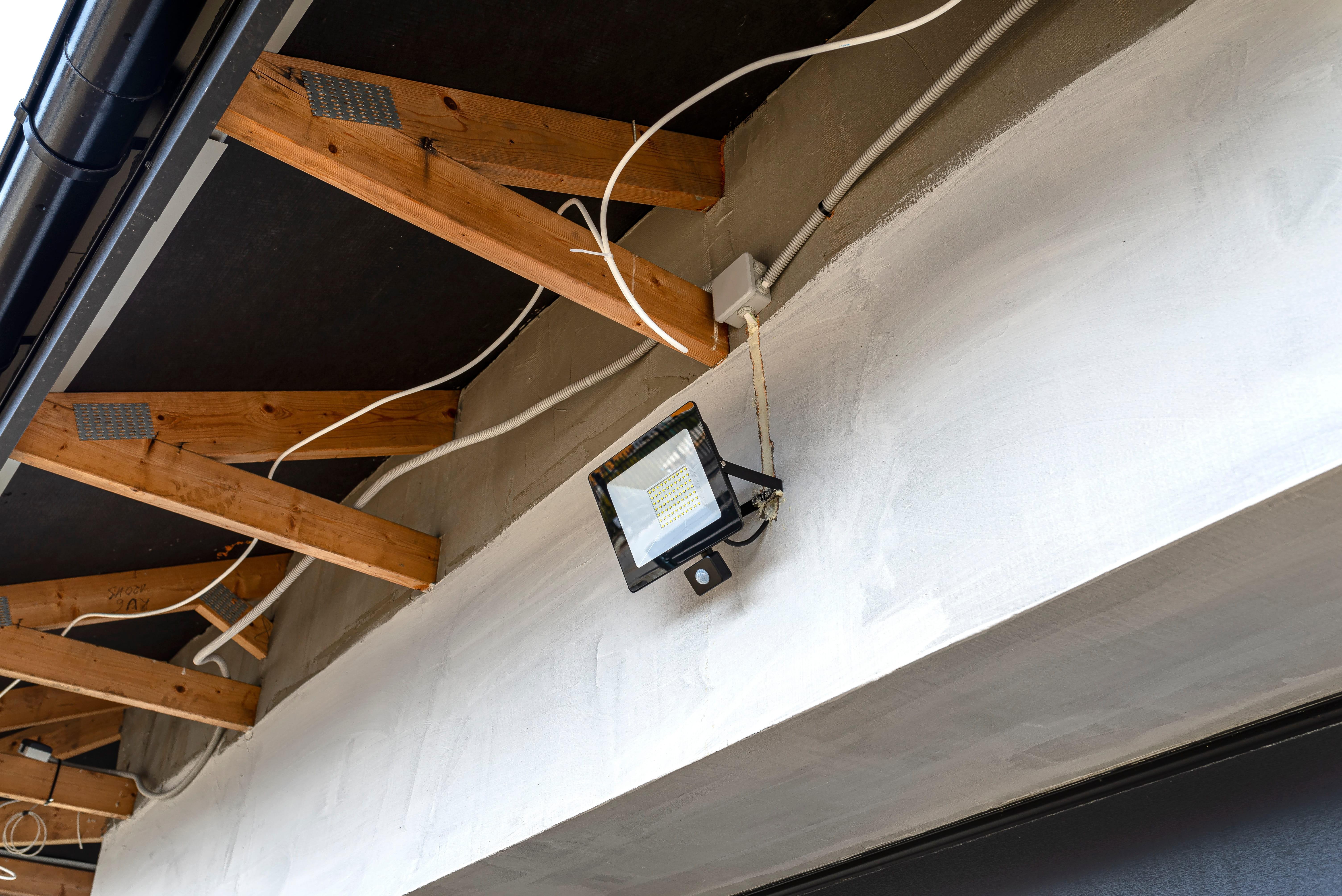 Security Systems Lenz Exterior lighting security systems mounted high on exterior wall